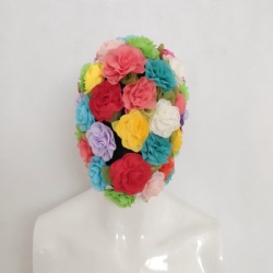 Colorful flower headwear artist