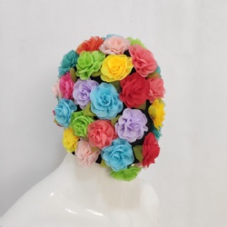 Colorful flower headwear artist