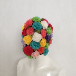 Colorful flower headwear artist